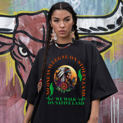 NO ONE IS ILLEGAL ON STOLEN LAND. WE WALK ON NATIVE LAND